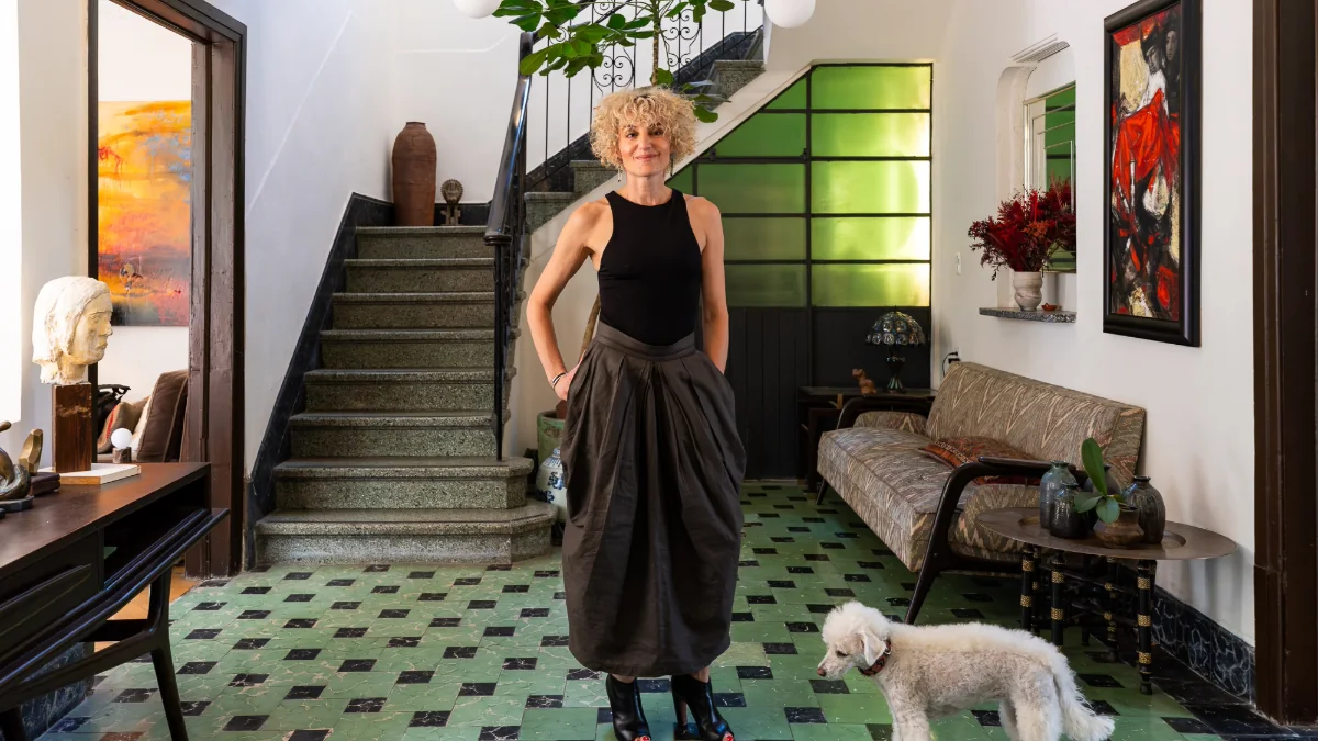 Stellah in the tiled entry hall of Casa de Reunión